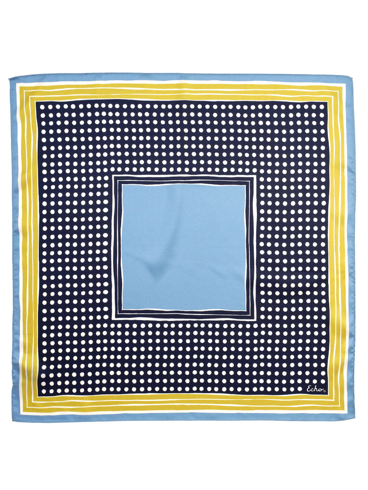 Square bandana: light blue center, navy/white polka dot field, bordered by white, yellow, & light blue stripes.