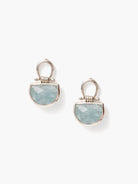 Pair of silver-toned post earrings, each featuring a faceted, D-shaped light blue aquamarine stone.