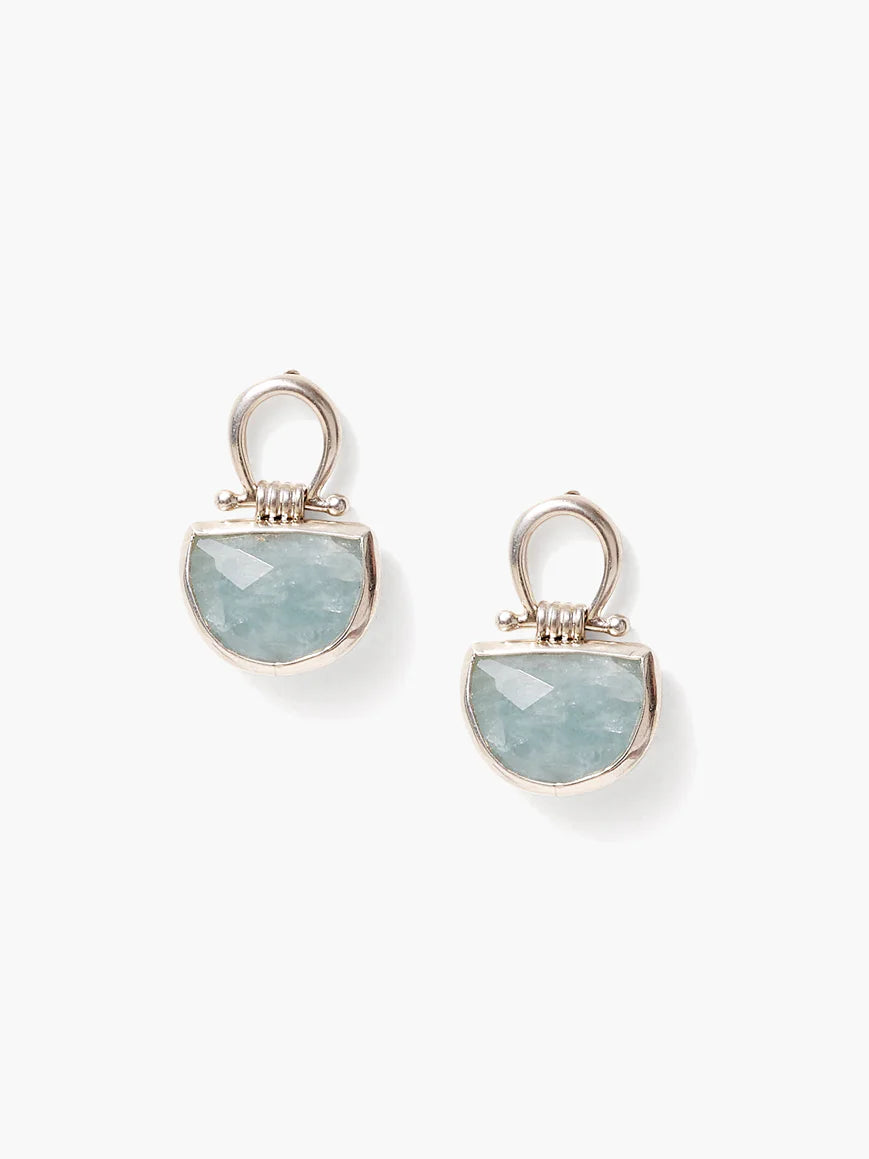 Pair of silver earrings. Each features a pale blue, faceted, half-moon aquamarine stone set in a silver frame with a...