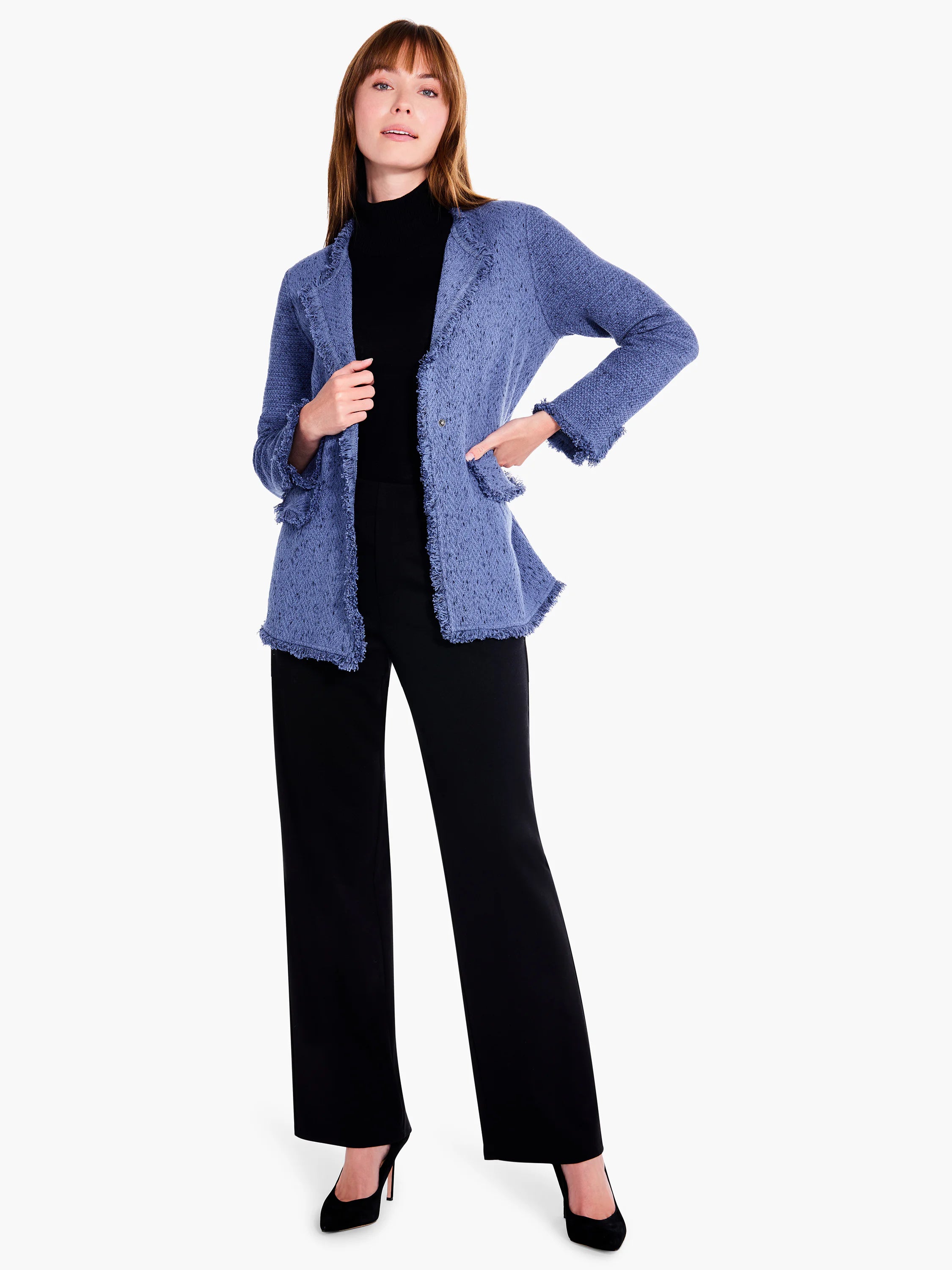 Blue knit blazer with fringe trim.  Single button closure. Model wears black pants & shoes.