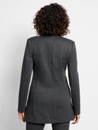 Back view of a dark gray knit jacket with thin white vertical pinstripes.