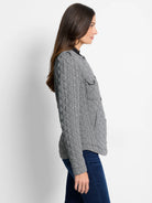 Black and white quilted plaid jacket with diamond stitching, button front, and two chest flap pockets.