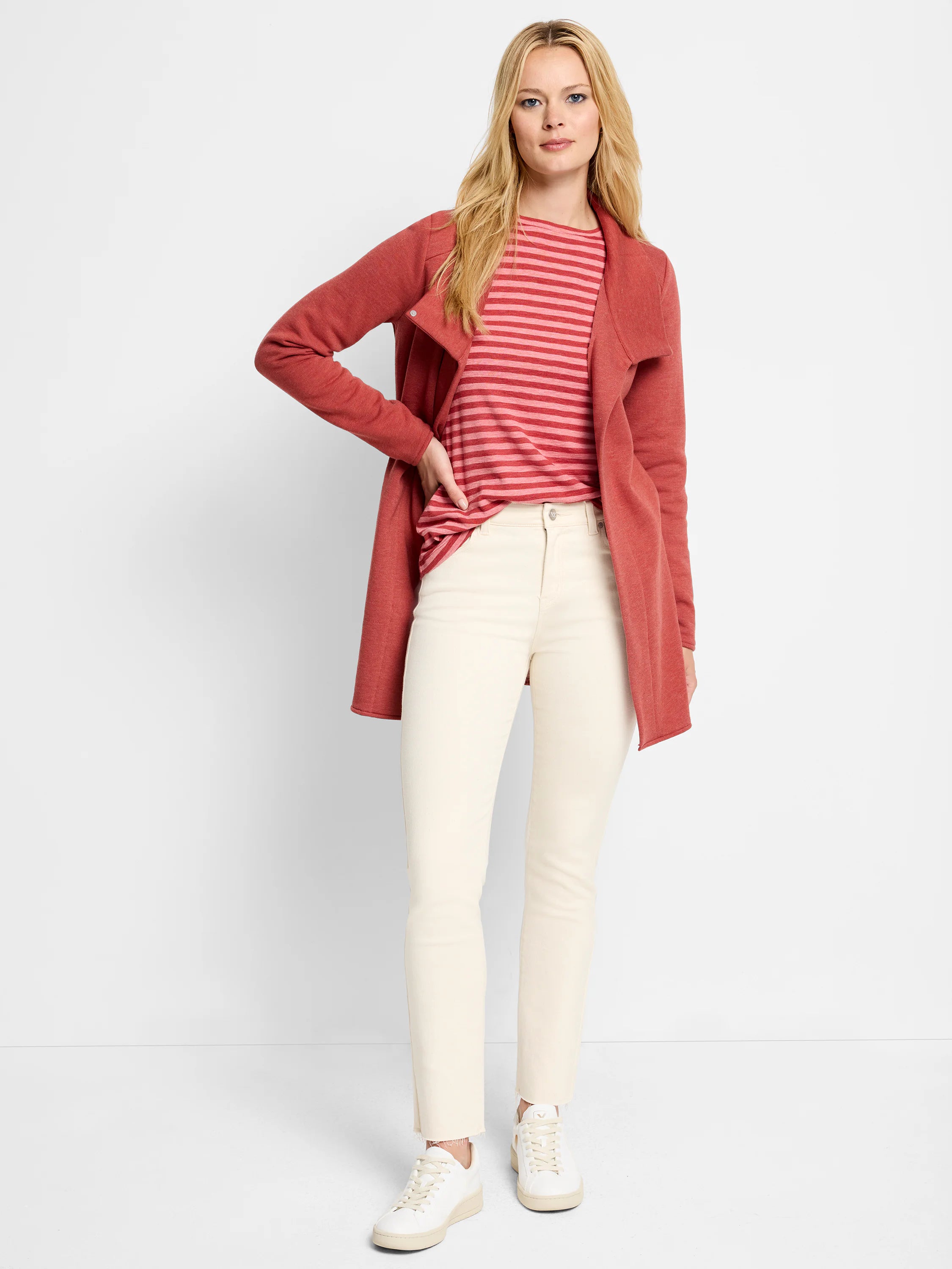 Around Town Jacket: Rust-red, open front, long-sleeved, mid-thigh length, soft knit.