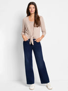 Light tan Perfect Knit Rib Scoop Tank. Ribbed texture and scoop neckline visible under a cardigan.