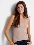 Light brown ribbed knit scoop neck tank on a model.