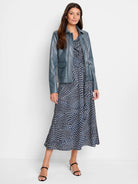 Slate blue faux leather jacket with a collar, zip closure, and two flapped chest pockets.