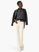 Black faux leather jacket, slightly shiny, with a collar, front zipper, and zippered chest pocket.