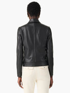 Black faux leather jacket, back view, with a collar, vertical seam, and hem band.