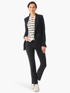 Dark gray corduroy jacket with ribbed texture, notched lapels, and a silver zipper detail on the right side.