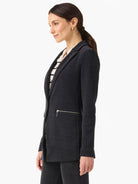 Dark gray corduroy blazer with notched lapels and a silver-tone zipper pocket on the front.