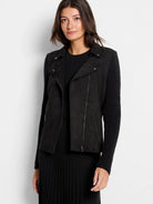 Black mixed media moto jacket with suede-like body, knit sleeves, asymmetrical silver zipper, and snap lapels.