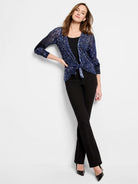 Cardigan with indigo, light blue & white dash pattern. Open front, long sleeves, tied at waist.