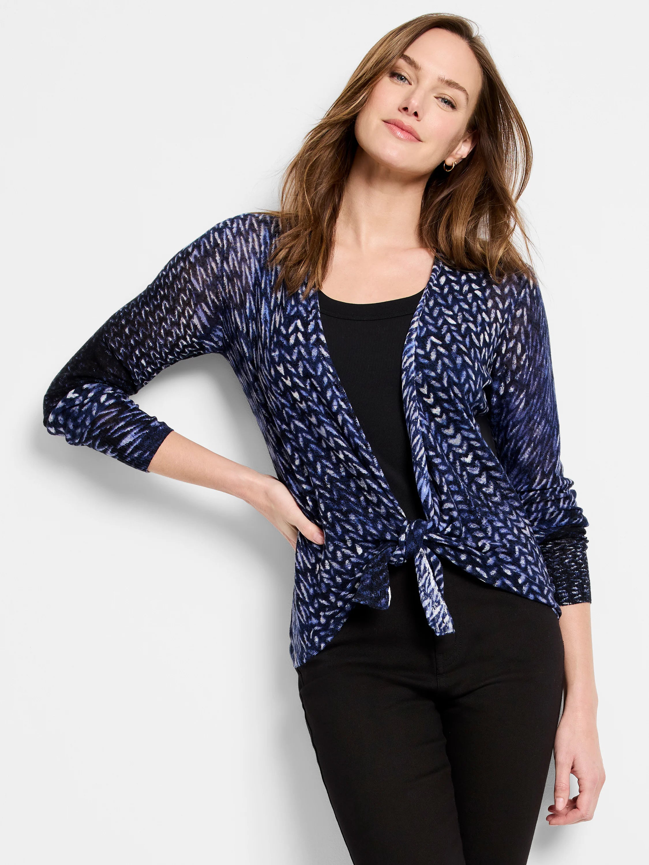 Indigo and white dashed knit cardigan, tied at the front.