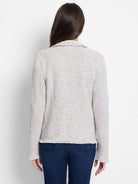 Back of light grey tweed-style knit jacket with collar and fringe trim on hem and cuffs.