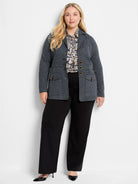 Heathered dark grey knit blazer with four flap pockets and prominent gold-toned buttons.