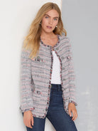 Grey, pink, & dark blue mixed knit jacket with fringe trim at neckline, front, cuffs, & faux pockets. Round grey buttons.