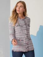 Pink, cream & dark grey tweed-style knit jacket. Fringe trim at collar, front, hem. Double-breasted with round buttons.