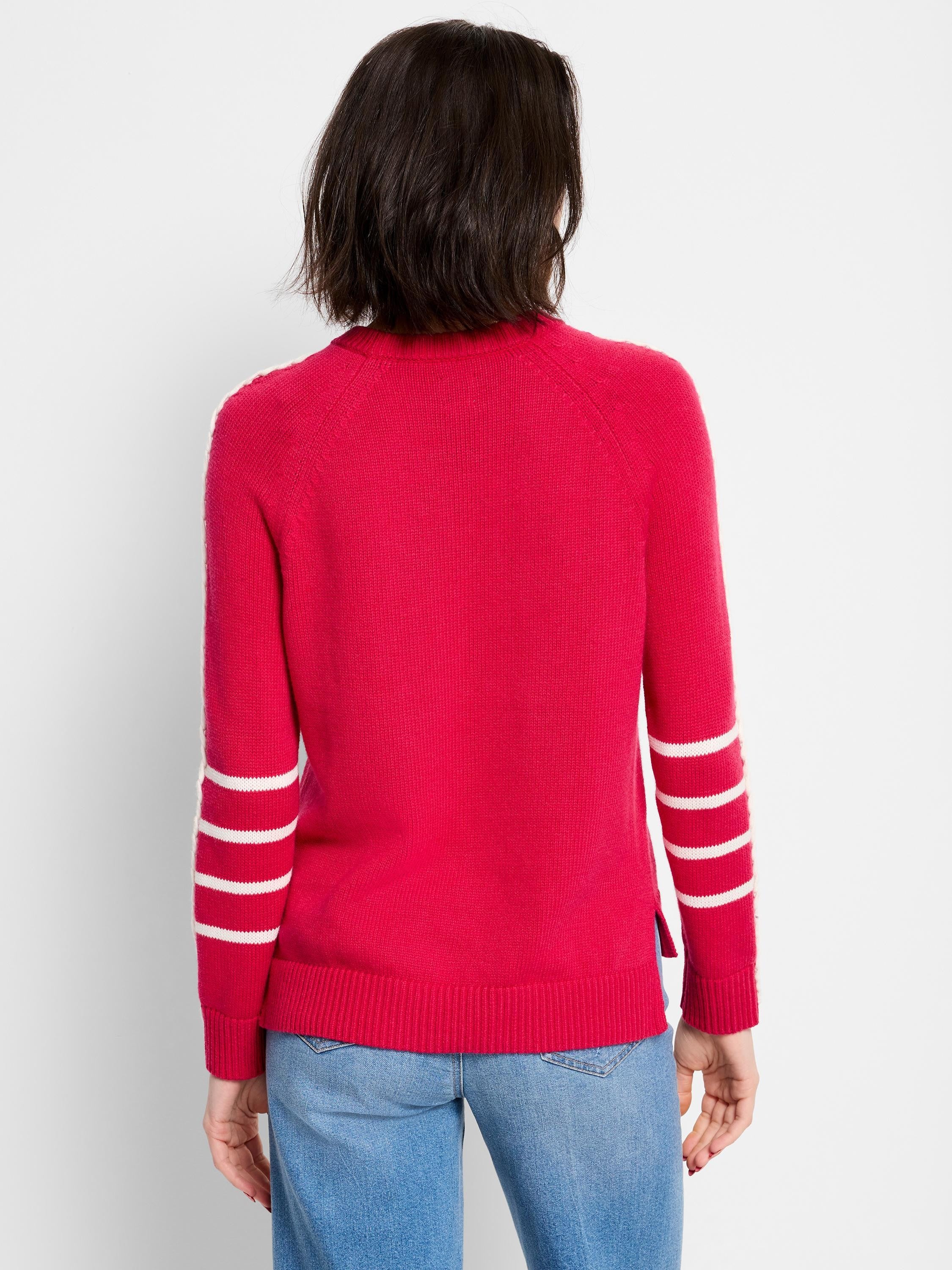 Bright red crewneck sweater with three white horizontal stripes on each raglan sleeve.