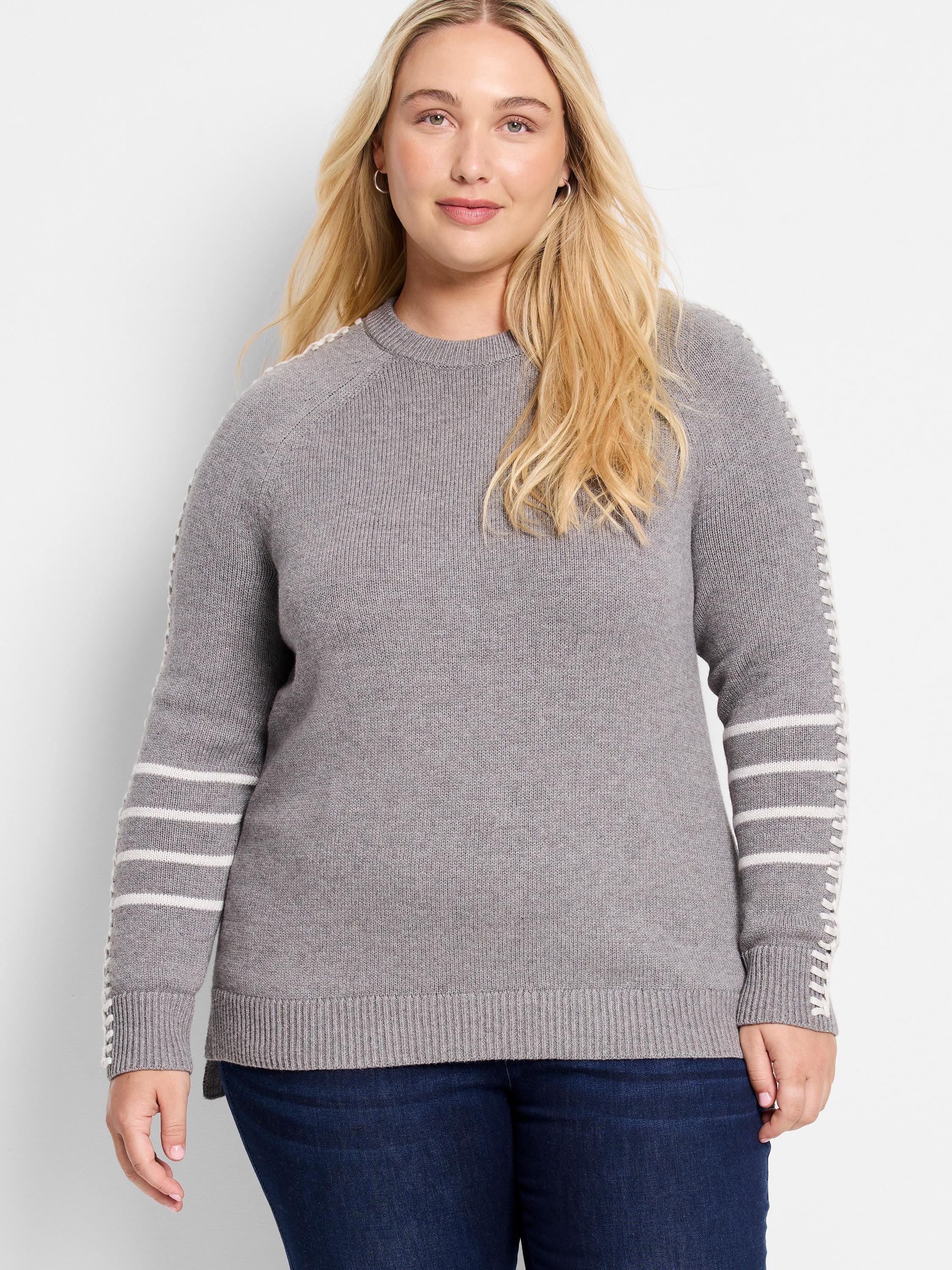 Grey ribbed crewneck sweater with white stitching along shoulder seams and three white stripes on lower sleeves.