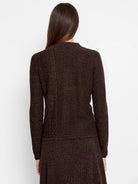 Brown and black knit sweater with a textured pattern. Long sleeves and a crew neck.