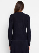 Dark navy blue, long-sleeved, textured knit sweater.  The texture is a waffle or honeycomb pattern.