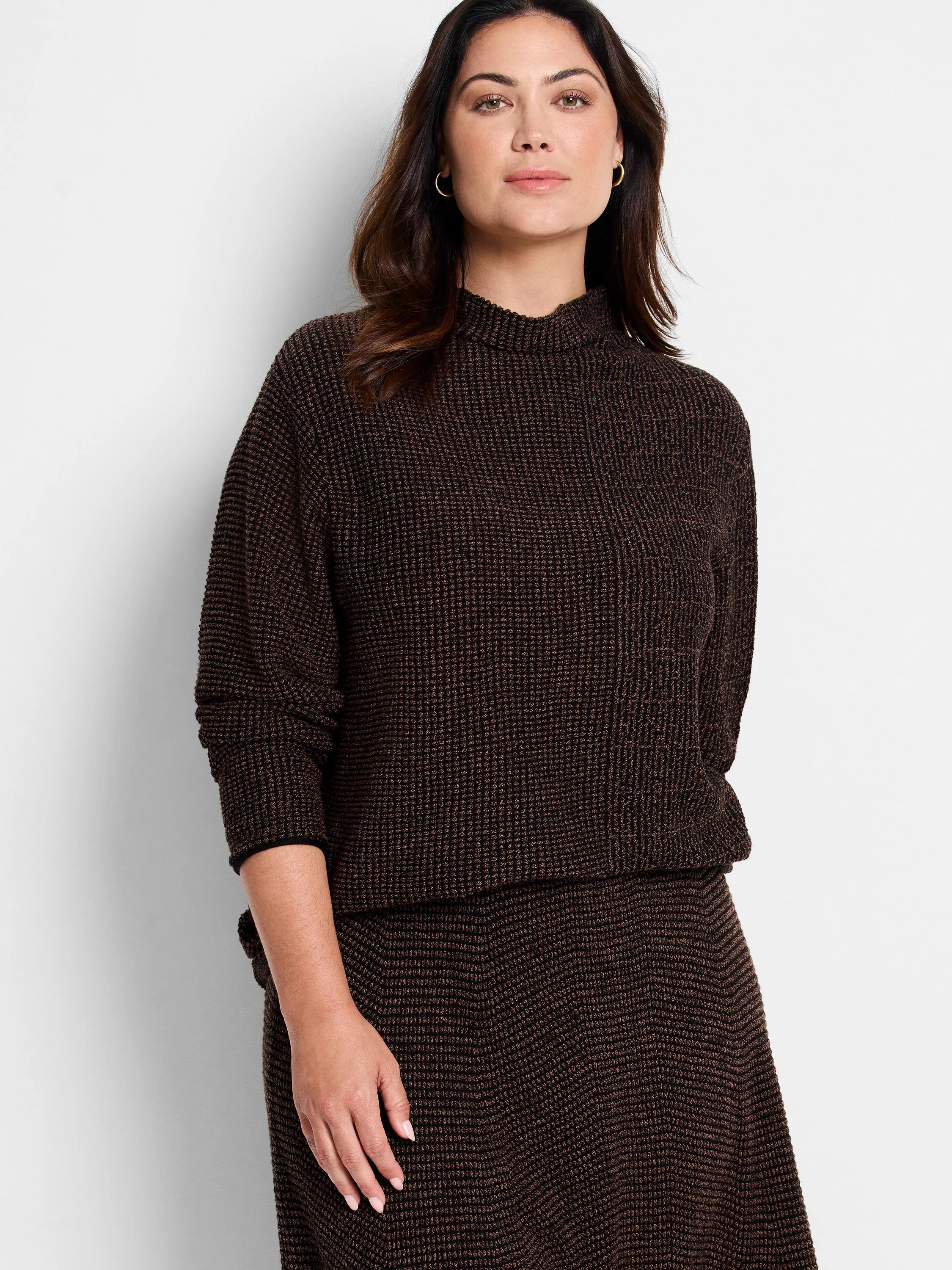 Brown mock neck sweater with a textured, waffle-knit pattern.  Slight metallic sheen.