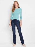Light teal ribbed long-sleeve shirt;  model wears dark wash jeans.
