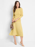 Pale yellow ribbed long-sleeve tee.  Fitted, crew neck.