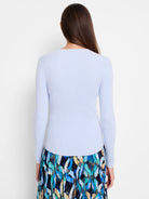 Light blue, ribbed, long-sleeved, fitted knit top.