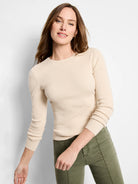 Off-white ribbed, long-sleeved crew neck sweater tee.