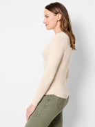 Beige ribbed, long-sleeved fitted sweater tee.