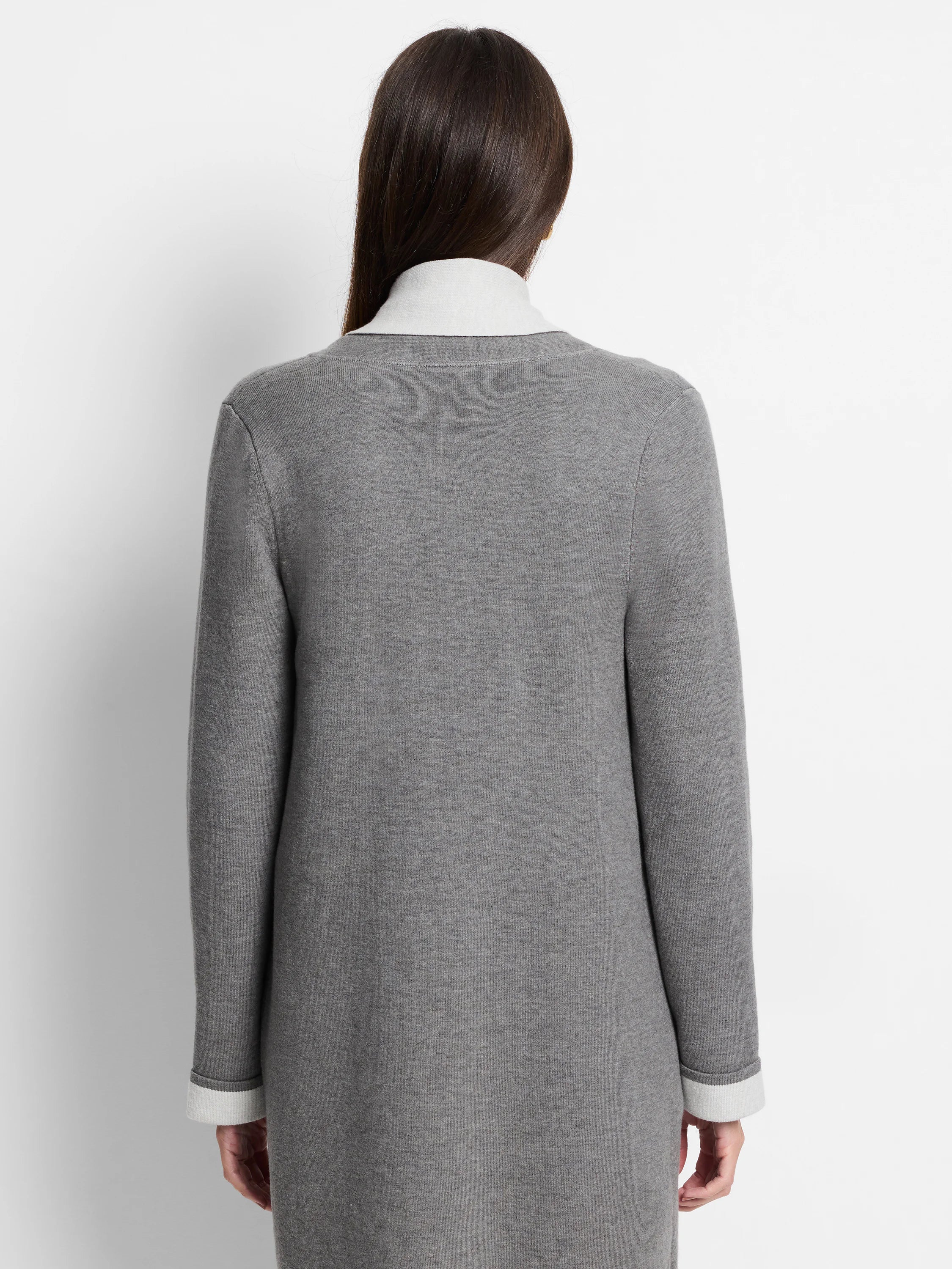 Gray long-sleeve jacket, off-white inner cuffs.  Reverse side not shown.