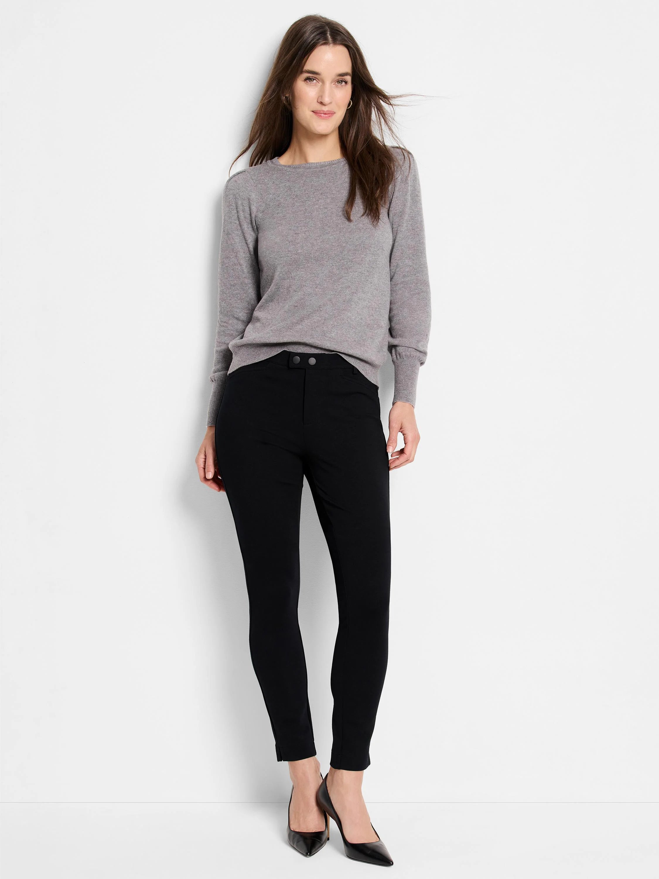 Grey crewneck sweater with long sleeves, ribbed cuffs, and hem.