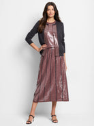 Mauve sequin knit tank with dark gray vertical stripes.  Model wears it with a dark gray cardigan.