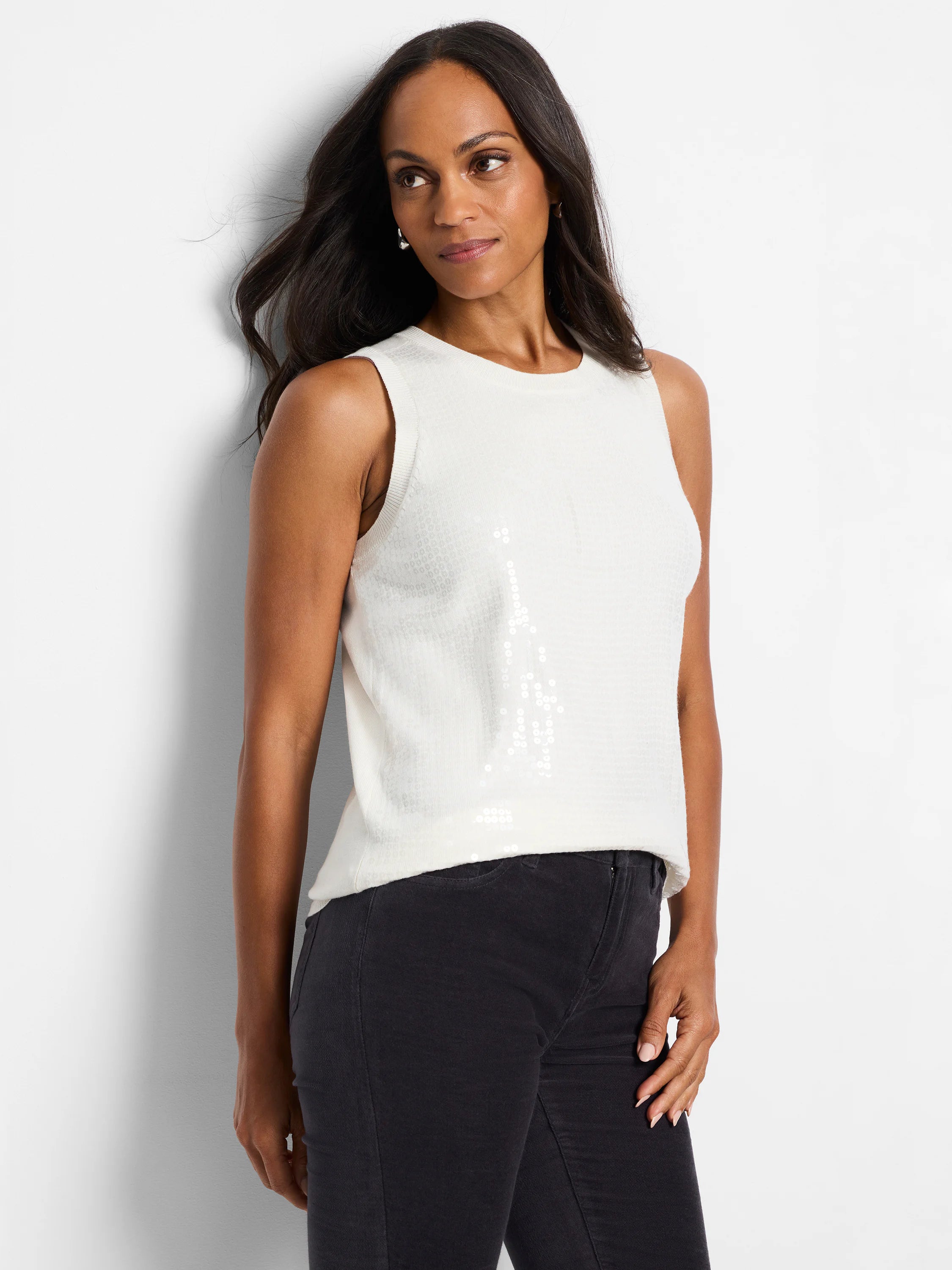 Off-white sleeveless knit tank with small, light-colored sequins forming a pattern on the side.