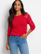 Red sweater with light pink sequins on shoulders.  Long sleeves, crew neck.