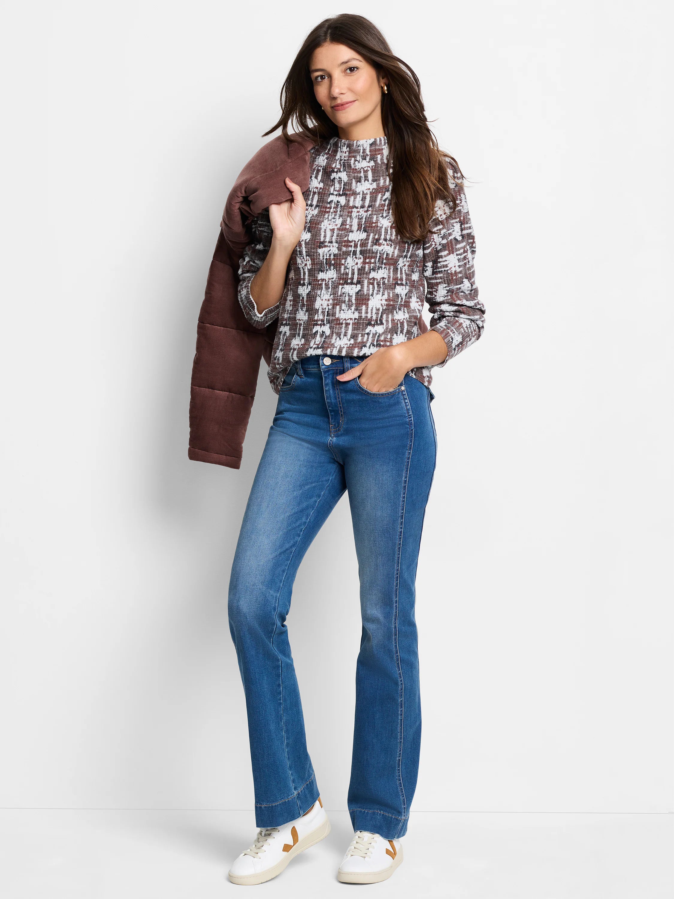 Waffle-knit mock neck sweater. Brown, white, and gray abstract pattern. Long sleeves.