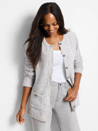 Light gray speckled knit jacket with darker gray trim and buttons.  Features pockets.