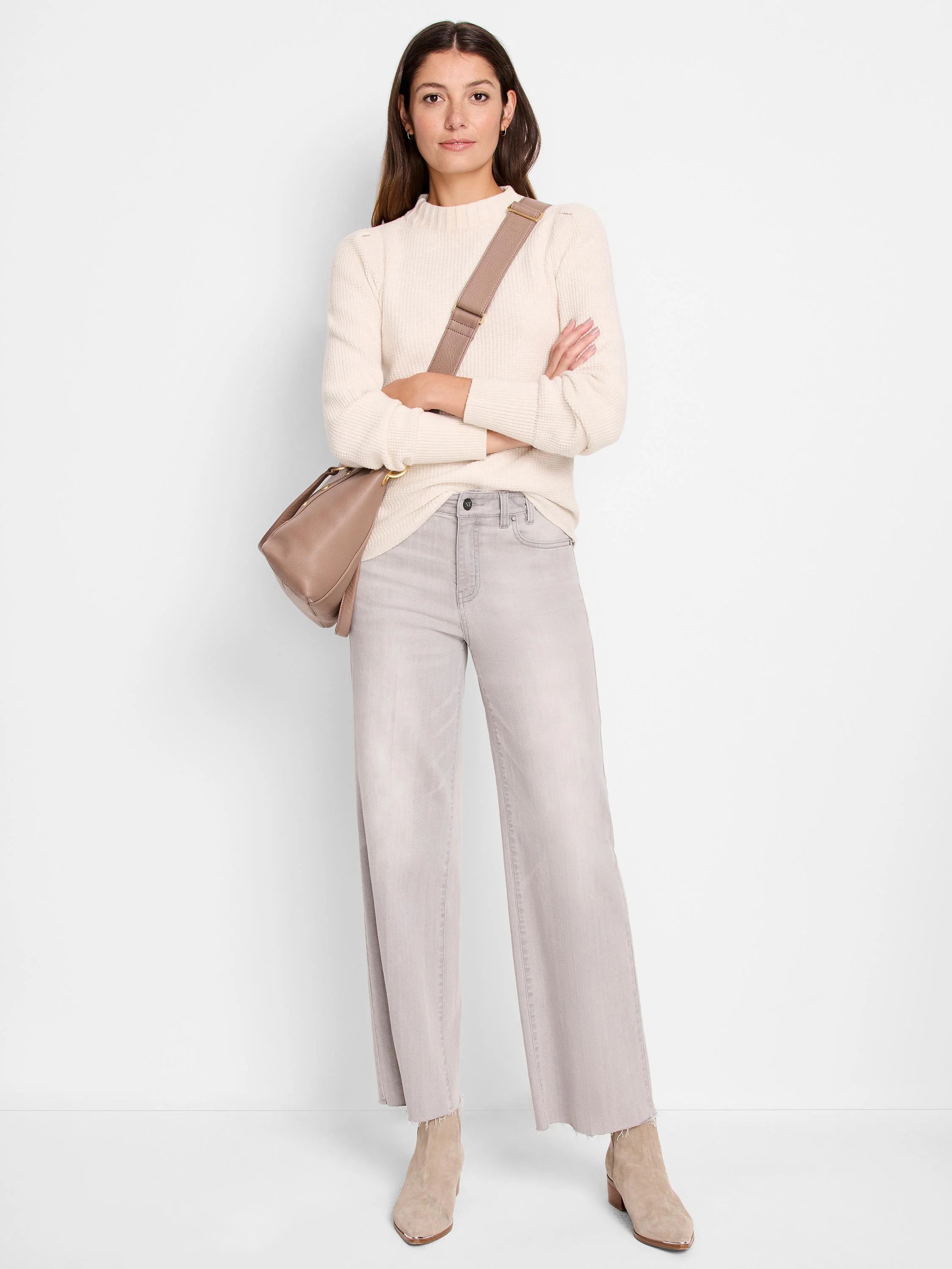 Off-white waffle-knit sweater.  Long sleeves, mock neck.