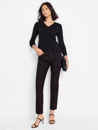 Black v-neck sweater tee; long sleeves.