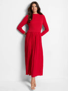 Red midi dress.  Fitted ribbed bodice, pleated skirt. Long sleeves.