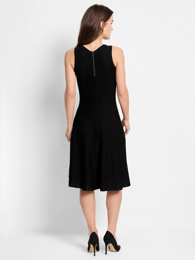 Black, sleeveless, ribbed knit A-line dress.  Hidden back zipper.  Midi length.