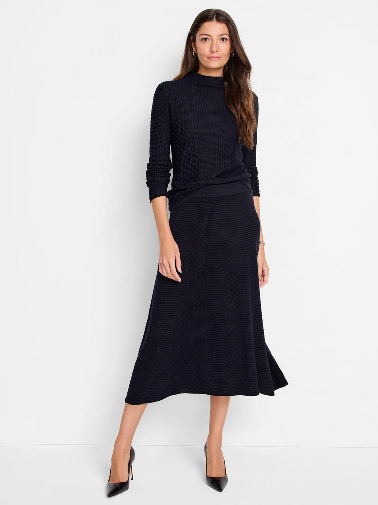 Dark blue midi A-line Pixel Knit Skirt with a visible textured, waffle-like pattern.