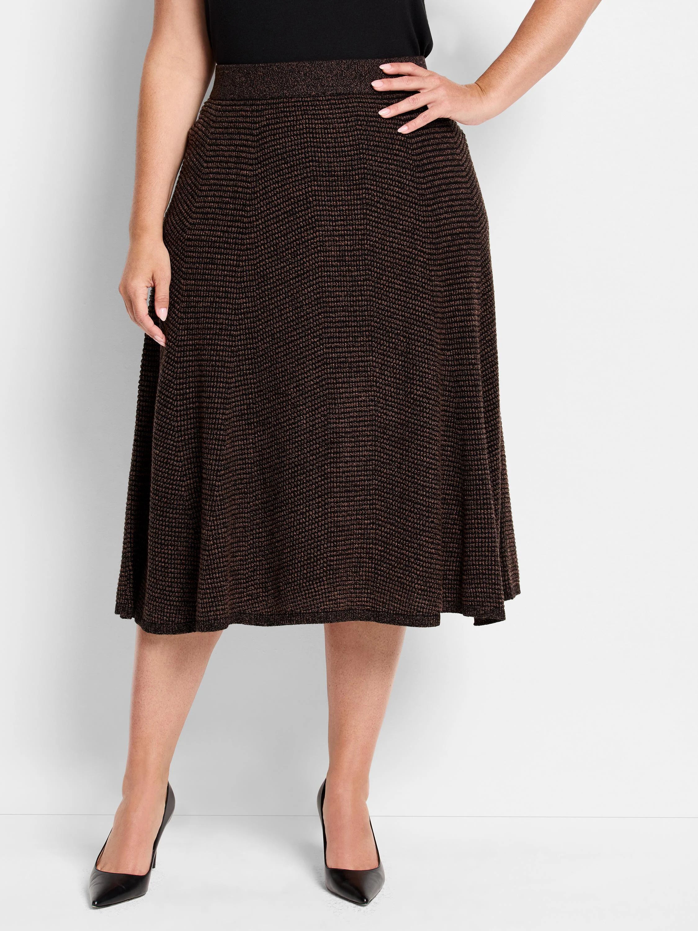 Dark brown knit midi skirt with an A-line silhouette and copper pixel texture.