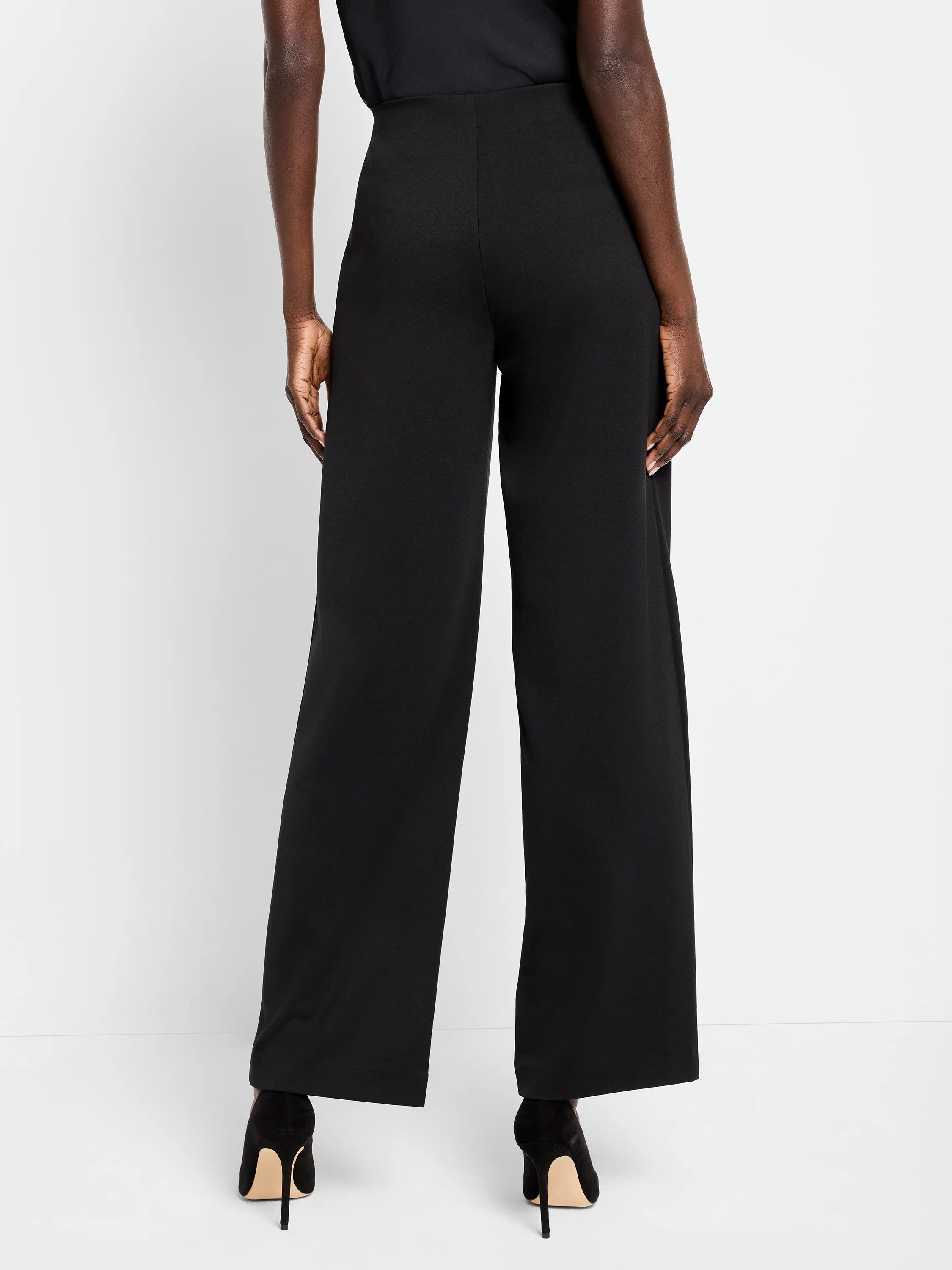 Black wide-leg pants; high-waisted, straight legs.  Shown from rear.