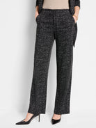 Black wide-leg pants with a small white grid pattern.  Pockets visible.