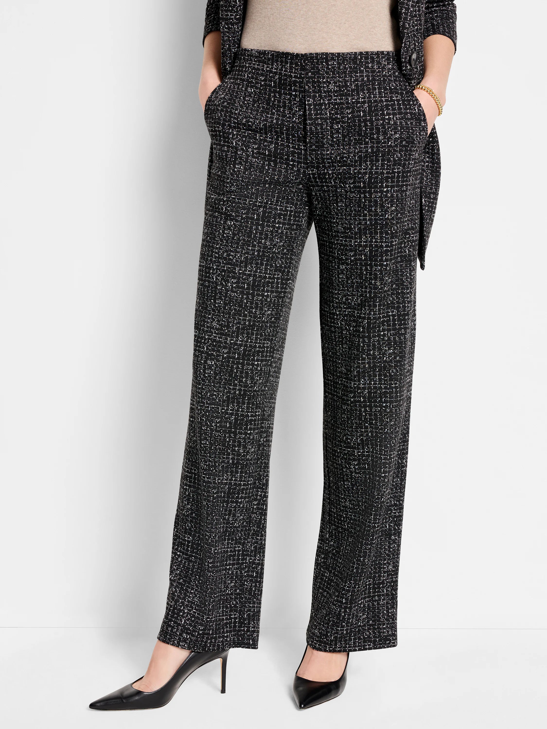Black wide-leg pants with a small white grid pattern.  Pockets visible.
