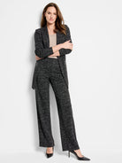 Black wide-leg pants with a small white grid pattern.