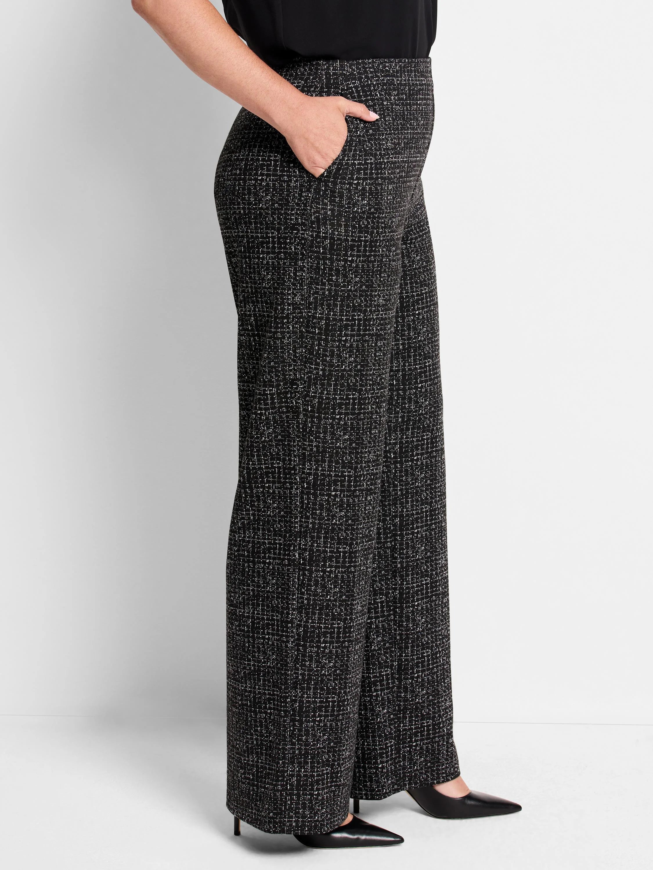 Black wide-leg pants with a small white dot grid pattern.  High waist, side pockets.