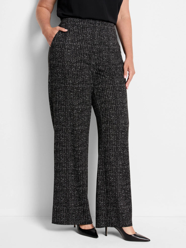 Black wide-leg pants with a small white and grey grid pattern.  High waist.